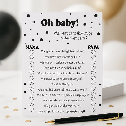 Zwart-witte babyshower quizkaart rechtop op een marmeren tafel met gouden confetti, zwarte pen en zwart-goud ballonnen