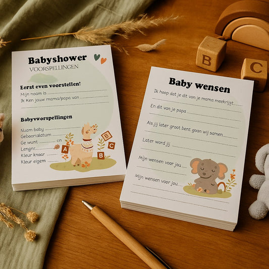 Babyshower invulkaarten met lama en olifantje op een houten tafel met knuffels, houten regenboog en pen